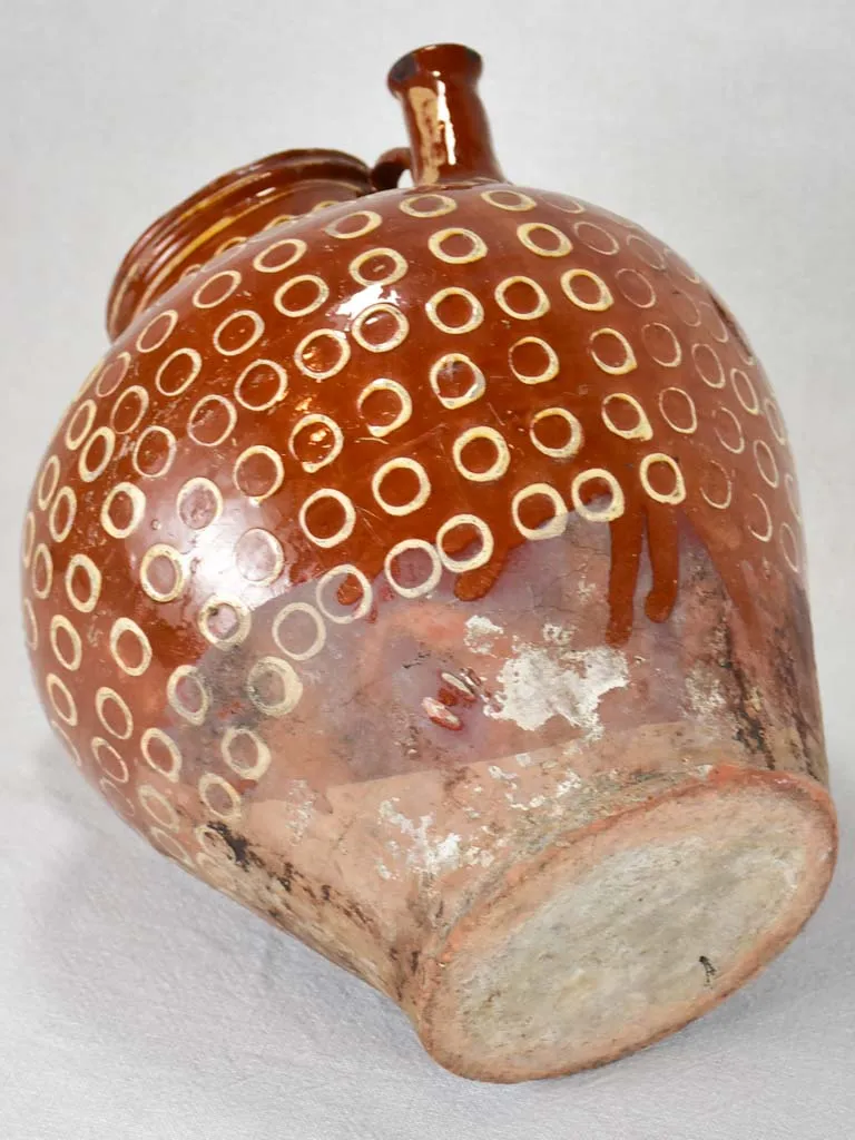 Late 19th century French water pitcher with brown glaze and beige spots