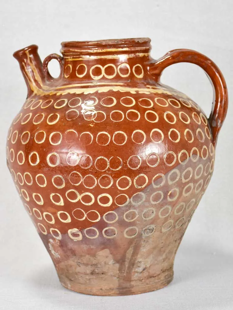 Late 19th century French water pitcher with brown glaze and beige spots