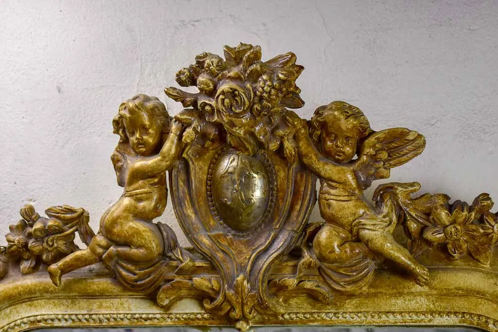 Napoleon III mirror with cherubs 30¼" x 61½"