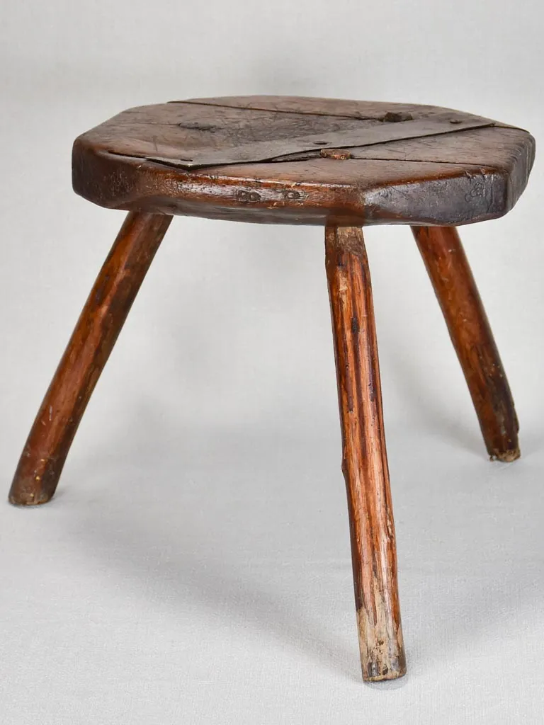 Primitive antique French milking stool with old repairs 13½"